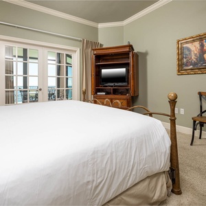 Unwind after a day at the beach in this elegant king master suite surrounded by stylish accents