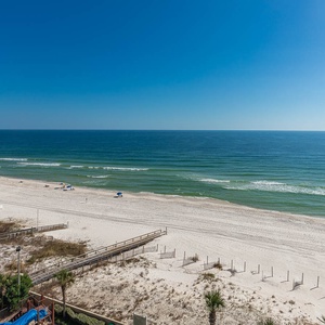 Breathe in the fresh coastal air from your balcony, soaking in the panoramic views and sounds of beach life