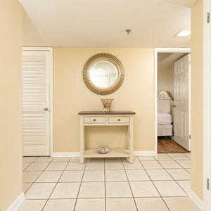 Neutral entryway brightens with gentle tones as you prepare to explore your vacation retreat