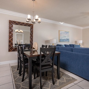 Dine in style at the elegant table, surrounded by tasteful decor and a beach view that invites relaxation