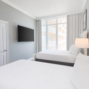 Relax in this dual queen suite and stream your favorite shows enjoying stunning coastal views