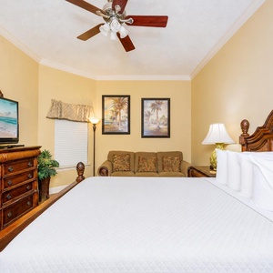 Sink into restful nights on the queen bed in this guest room, enjoying serene decor and cozy seating for quiet moments