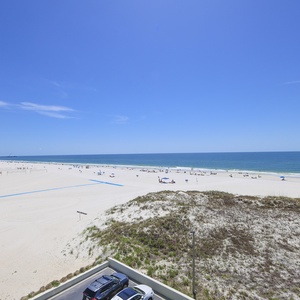 Enjoy refreshing beachfront views from this inviting space, perfect for relaxation and beachside fun