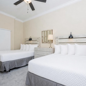 Relax on one of the cozy double beds in this guest suite and enjoy a peaceful slumber