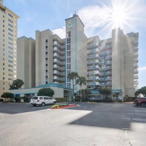 Discover a welcoming beachfront property with on-site parking and a coastal atmosphere for a relaxing getaway