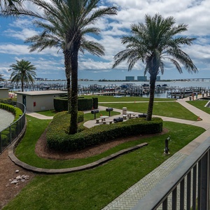 Watch the sun glisten on the water from your bayfront balcony and watch boats traverse the bay with the daily catch