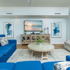 Unwind in the plush seating, enjoying serene views while streaming your favorite shows on the TV