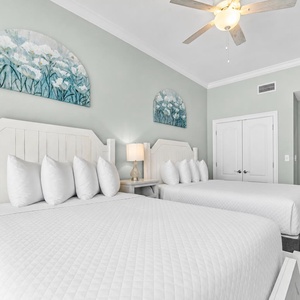 Relax on one of the cozy queen beds in this guest suite and enjoy a peaceful slumber