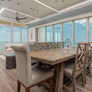 Enjoy a fun family game night in this stylish space with panoramic views of the coast to create lasting memories