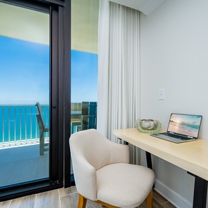 Settle into the cozy workspace with a beach view, perfect for catching up on emails or planning your next adventure