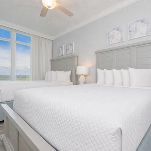 Experience peaceful nights in this guest suite with two queens, with amazing views inviting you to drift into sweet dreams