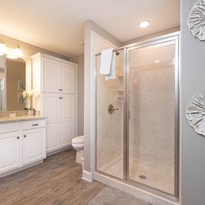 Pamper yourself in this tranquil guest bath, where elegant decor and soft towels create a serene retreat for relaxation