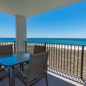 Balcony seating offers a serene view of the gulf and beach, perfect for enjoying morning coffee with the sunrise