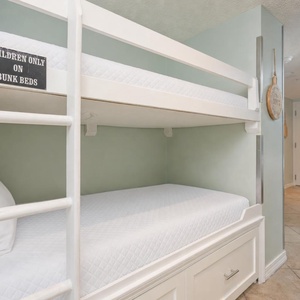 Bunk area invites kids to settle in with soft linens and create their own cozy retreat during your stay