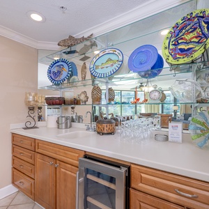 Grab a chilled bottle from the wine cooler or create your favorite cocktail at the wet bar