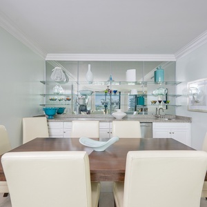 Gather around the elegant dining table and enjoy quality time surrounded by delightful decor