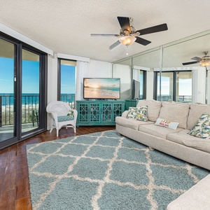 Relax in the inviting living room, streaming your favorite shows while admiring the coastal views from your balcony