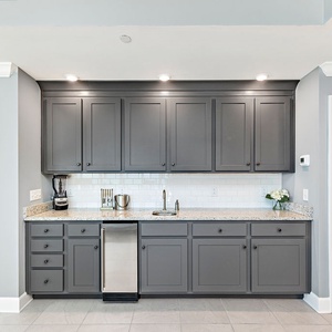 Blend a smoothie or cocktail at the wet bar, enjoy warm recessed lighting and stylish cabinetry