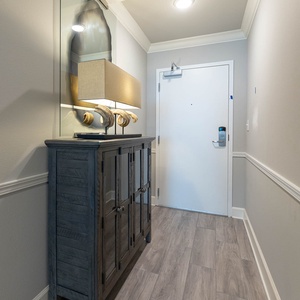 Step into the entry and admire the decor inviting you to explore this charming vacation rental