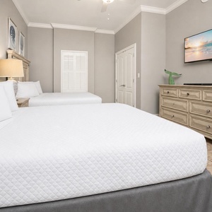 Unwind in this queen guest suite and stream your favorite shows or enjoy a good movie after a beach day