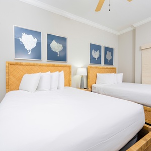 Relax on one of the cozy queen beds in this guest suite and enjoy a peaceful slumber