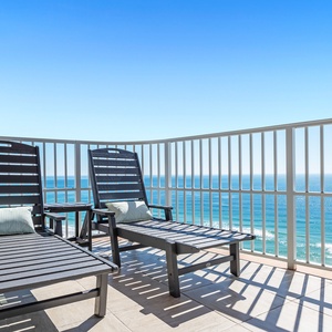 Lounge on the balcony overlooking the refreshing pool and beach area and nap with the sound of waves and seagulls