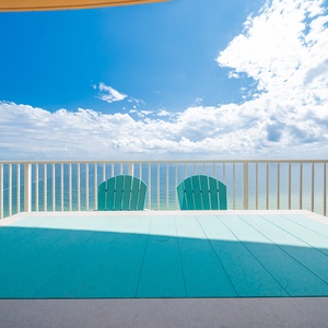Savor the coastal breeze while lounging on the spacious balcony, enjoying panoramic views and peaceful moments