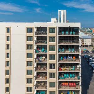 Enjoy stunning views of the beach from the vibrant balconies of this inviting vacation rental, perfect for relaxation