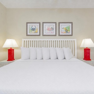 Experience restful nights in the king guest suite while colorful art enhances your coastal vibe