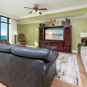 Unwind on the plush couch, reveling in coastal views while streaming your favorite shows on the TV