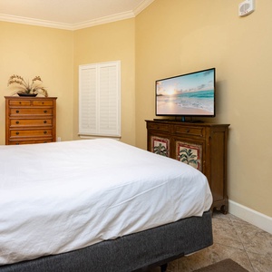 Sink into the soft queen bed, enjoying a cozy night as you stream your favorite shows on the TV nearby