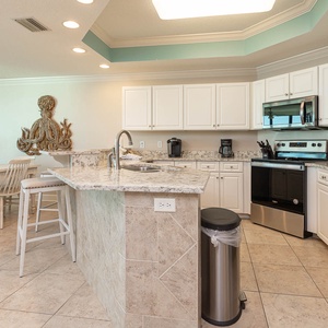 Prepare meals in the spacious kitchen, featuring stainless appliances, sylish countertops, Keurig and coffee maker