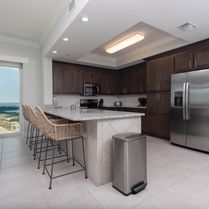 Pull up a woven barstool at the breakfast bar and sip coffee while watching the gulf