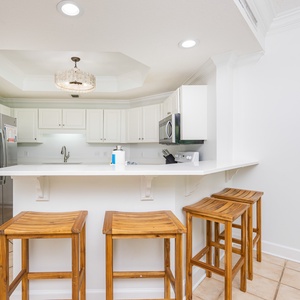 Sip your morning coffee at the breakfast bar and get ready for a day of adventure in this stylish space