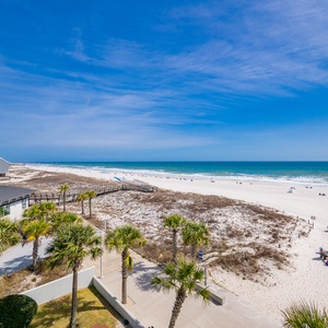 Tranquil, endless blue stretches across the coast as you savor peaceful moments from your balcony