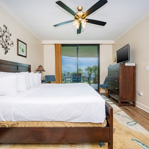 Retreat to the king master suite with cozy bedding and drift off to coastal sights and sounds of the bay