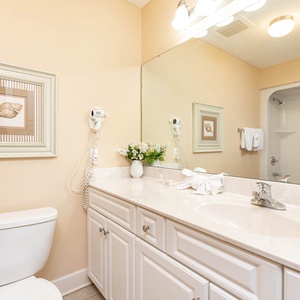 Experience refreshing mornings in this guest bath, indulging in a soothing shower before a day of adventure
