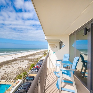 Unwind on your balcony, soaking up the beach views and gentle coastal vibe around you