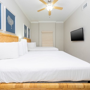 Unwind in this queen guest suite and stream your favorite shows or enjoy a good movie after a beach day