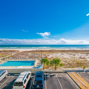 Bask in the sun on your balcony, admiring vibrant coastal views and embracing the relaxing sounds of the waves