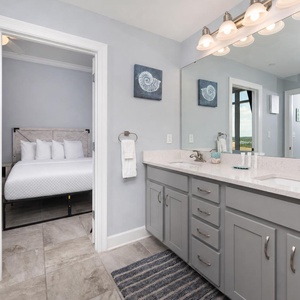 Refresh after a day at the beach in this guest bath with elegant accents