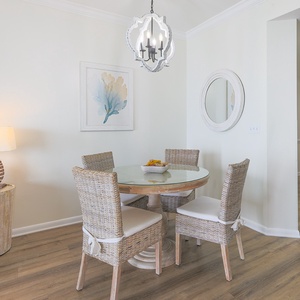 Enjoy casual conversations or game nights at the dining table, surrounded by inviting decor