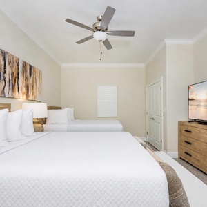 Unwind after a day at the beach in this queen suite with your favorite shows