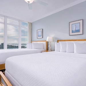 Two queen beds in this guest suite prepare you for restful nights after coastal adventures and city strolls