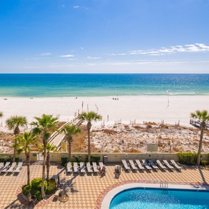 Enjoy the vibrant beach vibe from your balcony as you soak in the panoramic coastal views around you