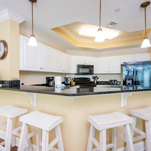 Gather your family around the breakfast bar, enjoying casual conversations and morning coffee in a friendly vibe