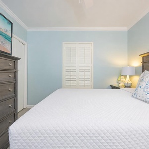 Beach-inspired art enhances the guest suite while you relax and stream your favorite show on the TV