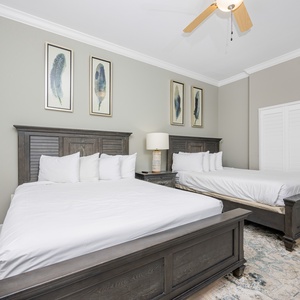 Recharge in the cozy guest bedroom, where plush queen bedding and serene decor set the perfect scene for restful nights