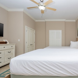 Unwind in this inviting guest room, enjoying the soft linens of queen beds and streaming your favorite shows