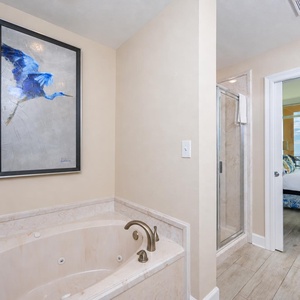 Jacuzzi tub in the master bath invites you to unwind after days filled with coast adventures